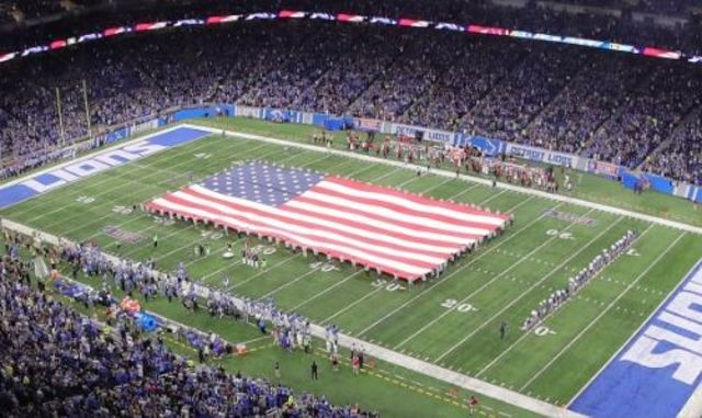 Ford Field national anthem ends with singer taking a knee