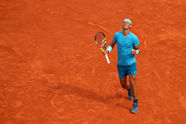 Nadal wins 11th French Open title by beating Thiem in 3 sets