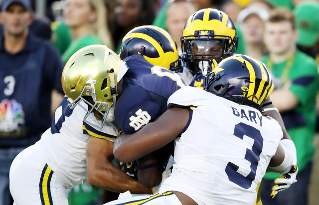 Armstrong, Notre Dame beat Michigan in season opener