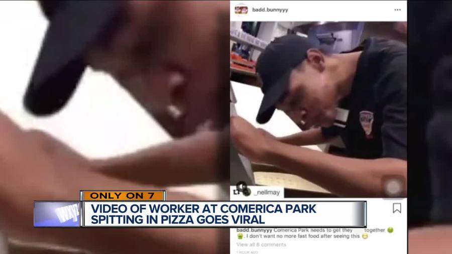 Comerica Park food services employee seen spitting on pizza in police custody - WXYZ.com
